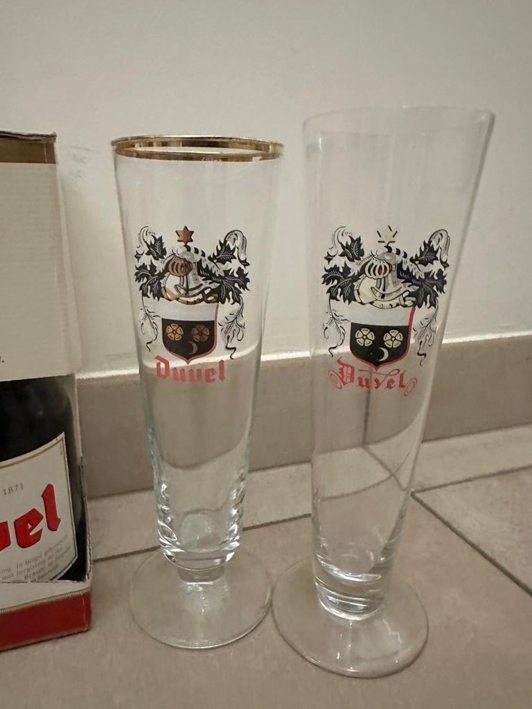 Duvelbox gouden letters en 4 verschillende fluitglazen, Ophalen of Verzenden, Zo goed als nieuw, Glas of Glazen, Duvel