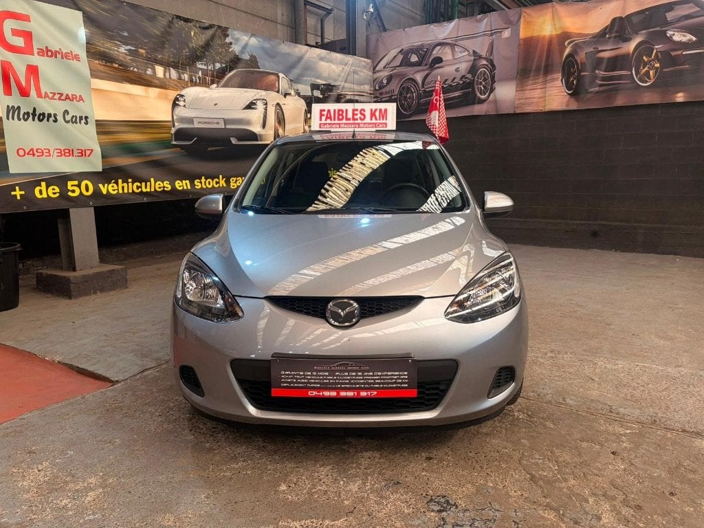Mazda 2 1.3i Airco, Electronic Stability Program (ESP), Handgeschakeld, 5 deurs, https://public.car-pass.be/vhr/1b0d6fe1-62bd-455e-8d4b-d8e671311dba
