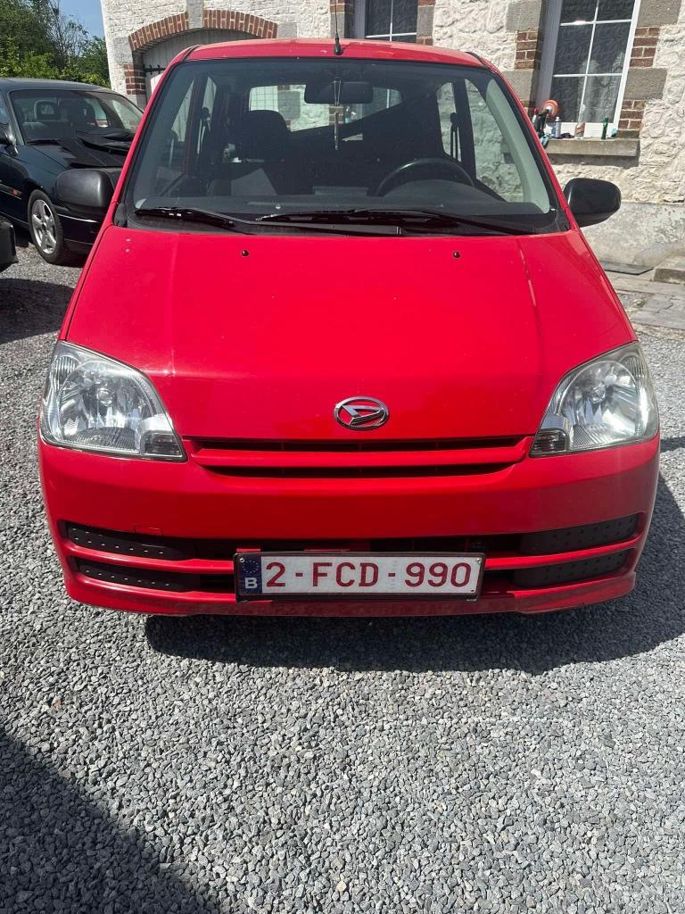 Daihatsu core 2006, Auto's, Daihatsu, Particulier, Cuore, Benzine, 3 deurs, Handgeschakeld, Rood, Grijs, Stof, Ophalen