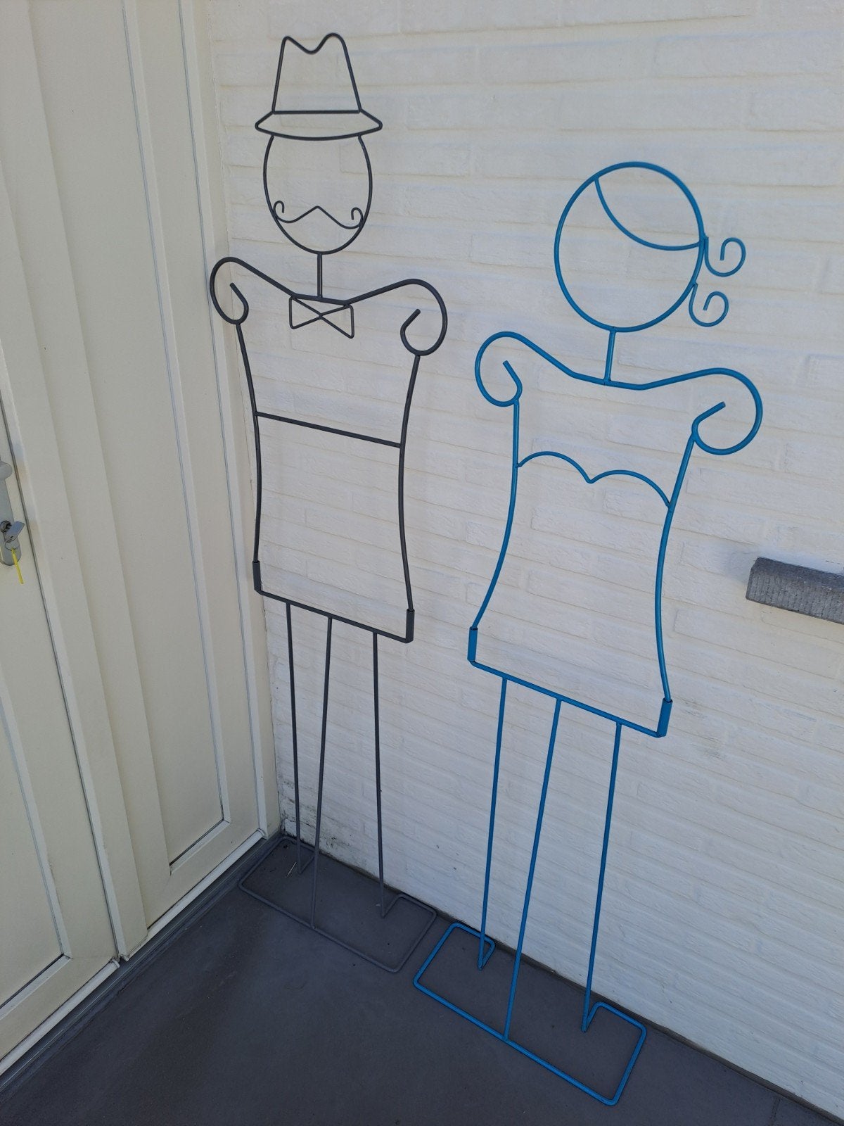kledingstaander man en vrouw, Ophalen
