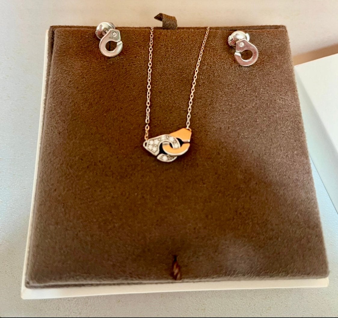 Parure Dinh Van Menottes XS – collier + puces d’oreilles, Handtassen en Accessoires, Ophalen of Verzenden, Zo goed als nieuw, Wit