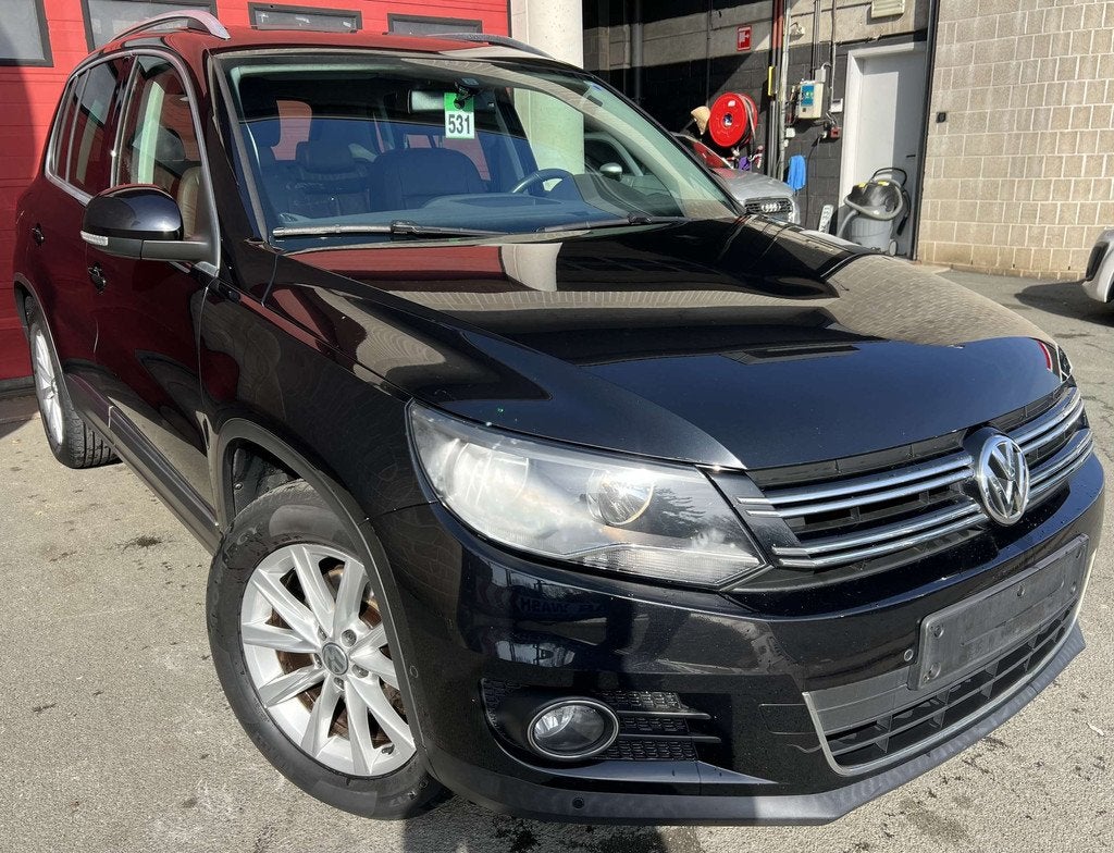 Volkswagen Tiguan 1.4 TSI + CUIR + NAVI (bj 2014), Auto's, 90 kW, Euro 5, 122 pk, Gebruikt
