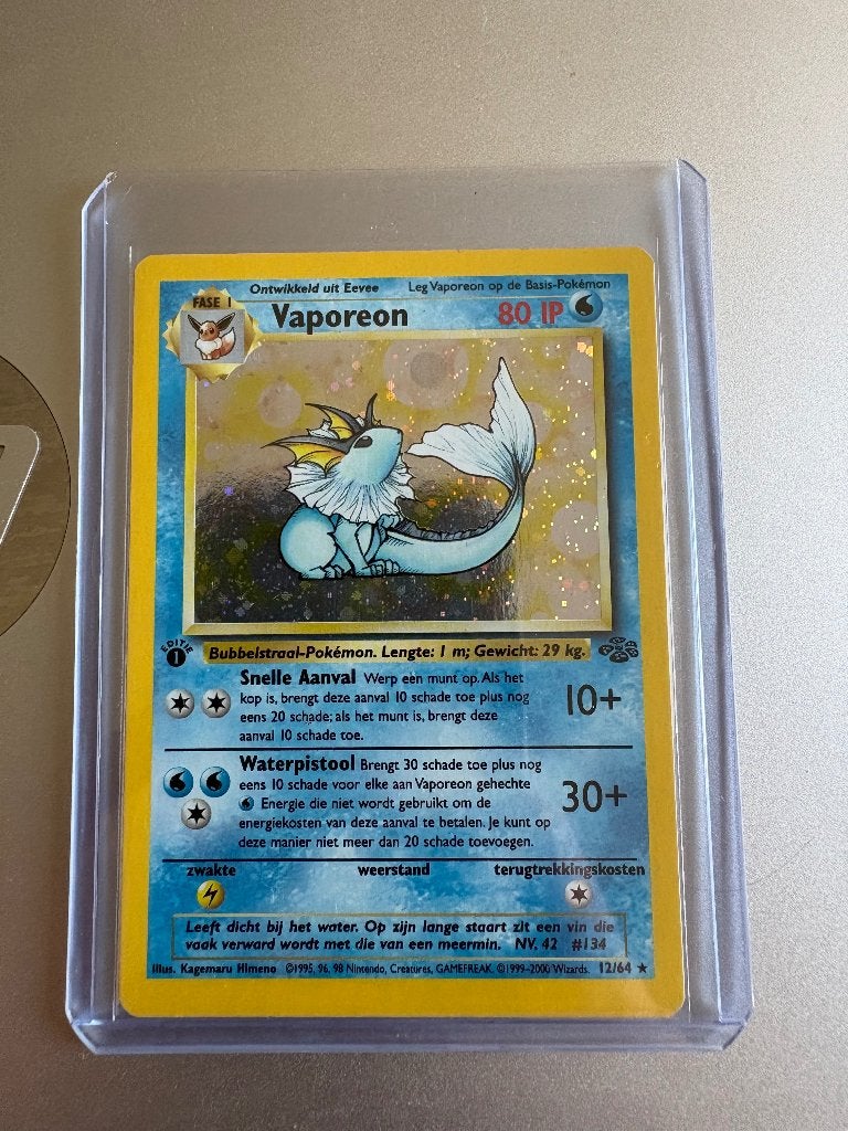 1st edition holo jungle vaporeon, Ophalen of Verzenden, Nieuw, Losse kaart