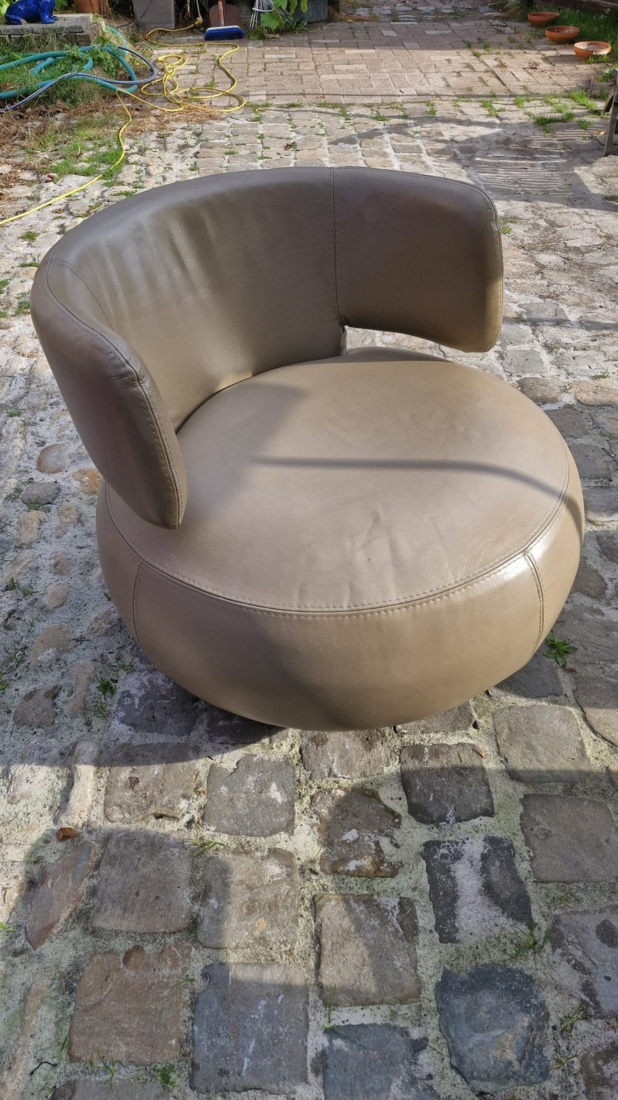 Fauteuil pivotant en cuir, Enlèvement