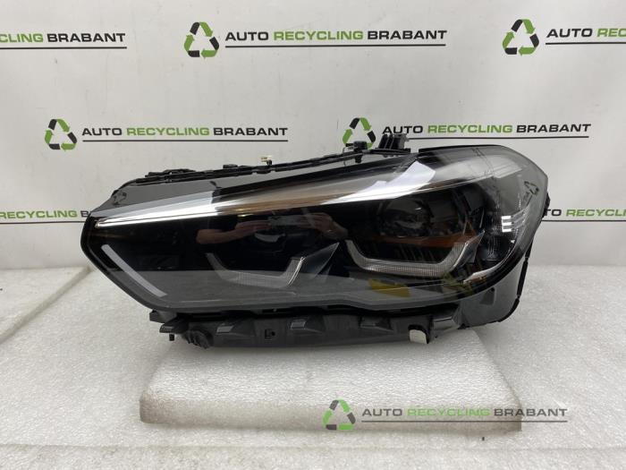 Phare gauche d'un BMW X5, Autos : Pièces & Accessoires, Éclairage, Utilisé, 3 mois de garantie, Enlèvement ou Envoi