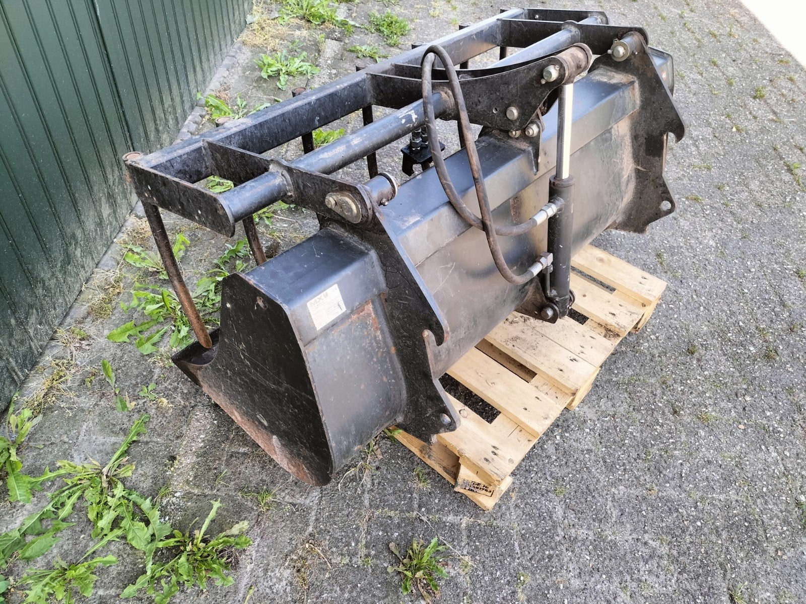 MX pelikaanbak mestbak minitractor miditractor, Enlèvement