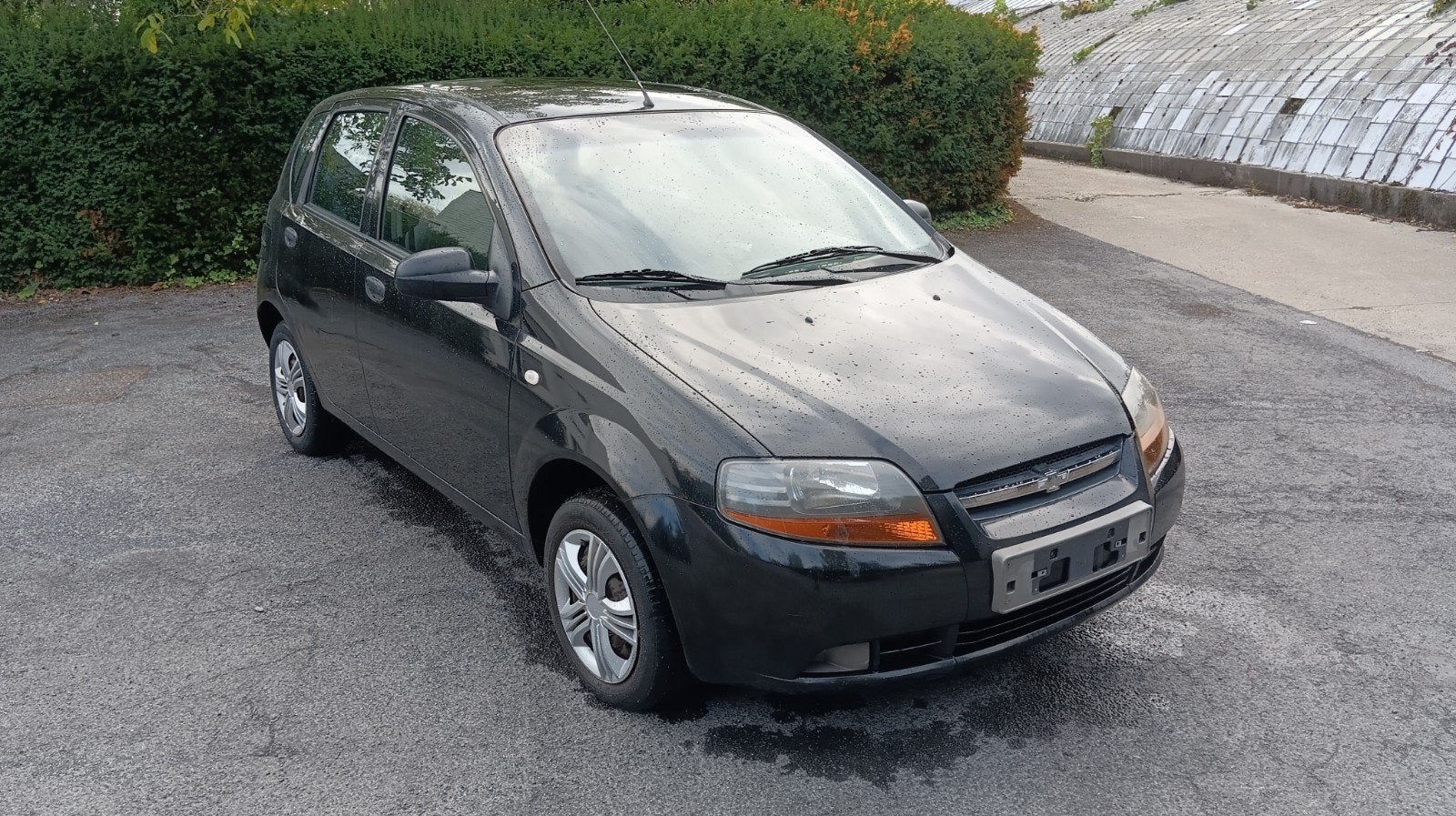 Chevrolet Aveo 1.2 Benzine  12 maand Garantie, Auto's, Stof, 4 cilinders, Zwart, Particulier