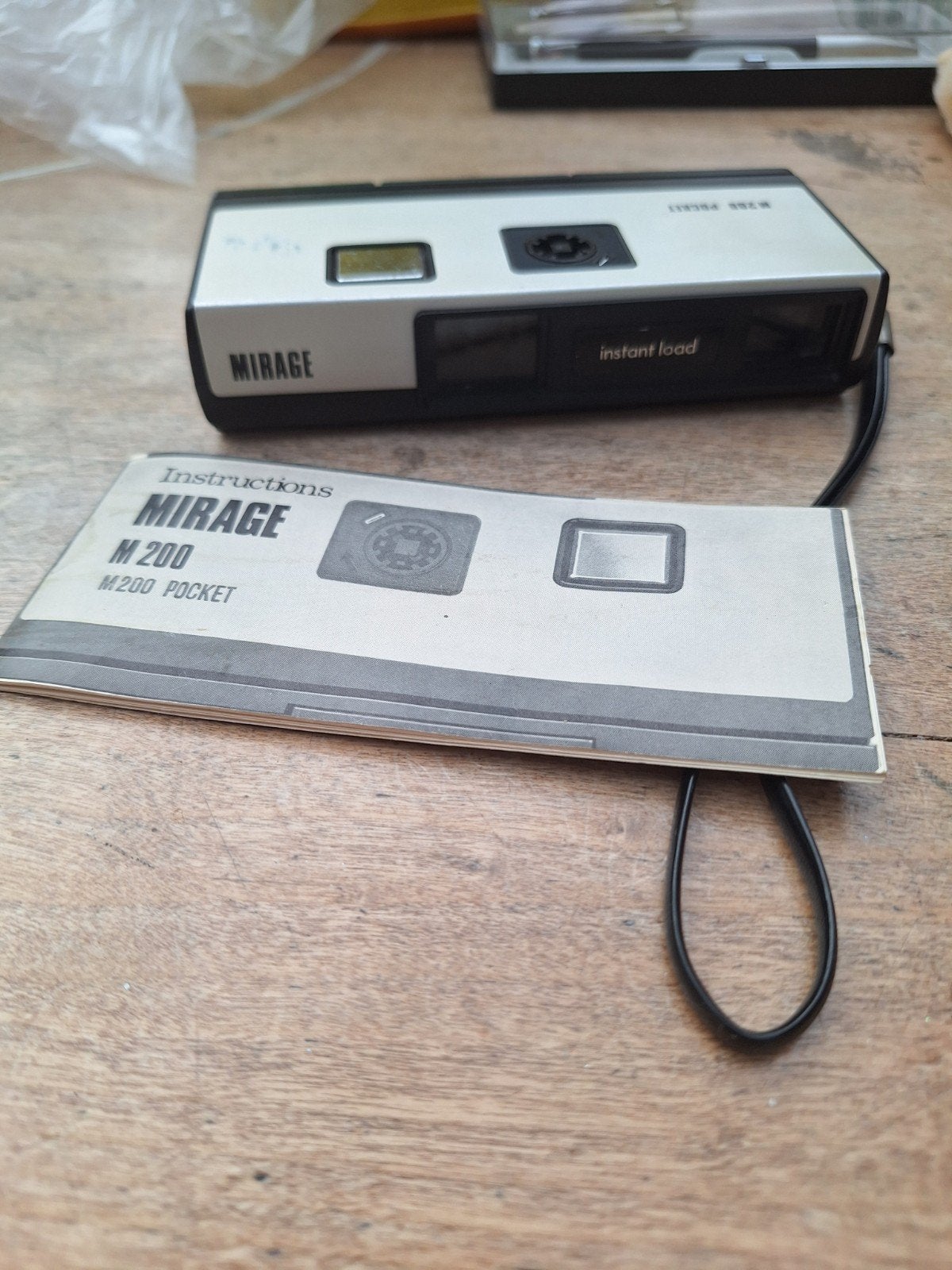 Mirage M200 Pocket (Analoge Fotocamera), Ophalen