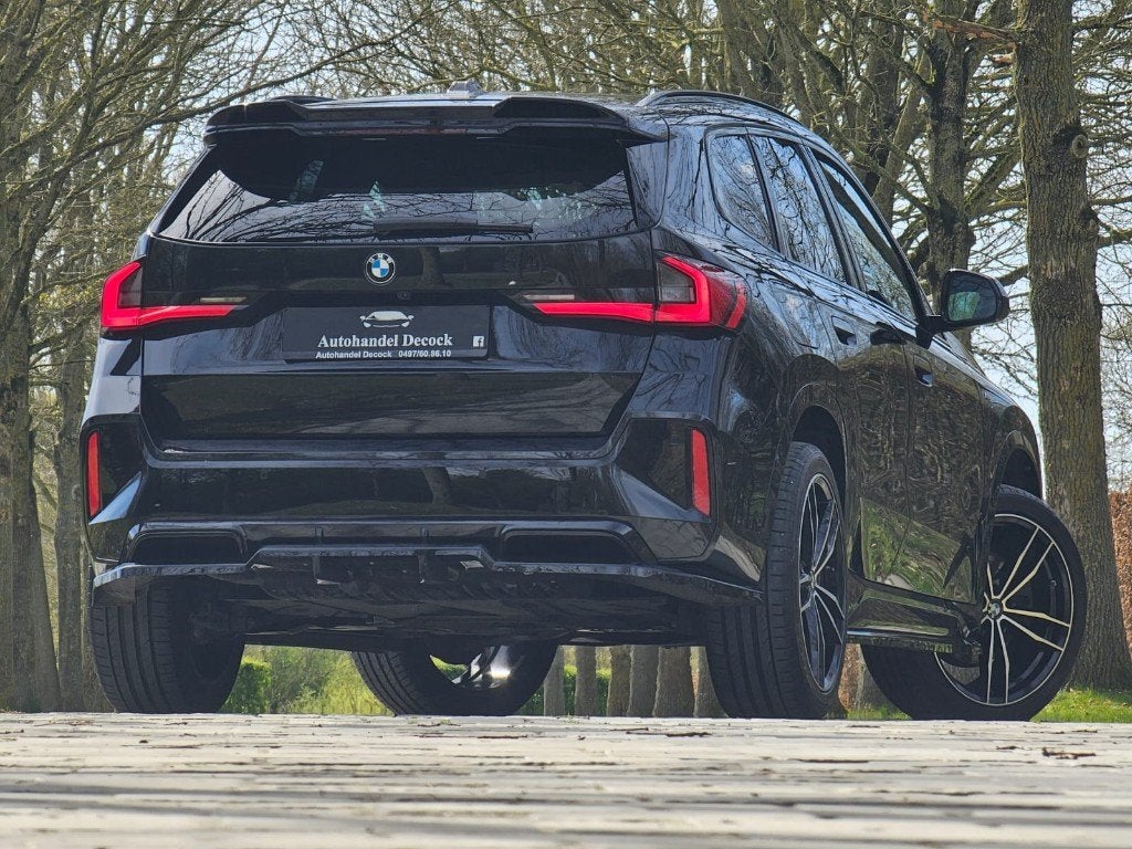 Bmw x1 sdrive 20i M sport 20Inch | TREKHAAK | CAMERA, 1800 kg, Lane Keeping Assist, Zwart, Leder