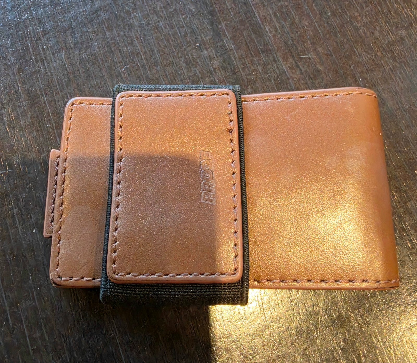 Portefeuille Proof, Bijoux, Sacs & Beauté, Enlèvement ou Envoi, Comme neuf, Brun, Cuir