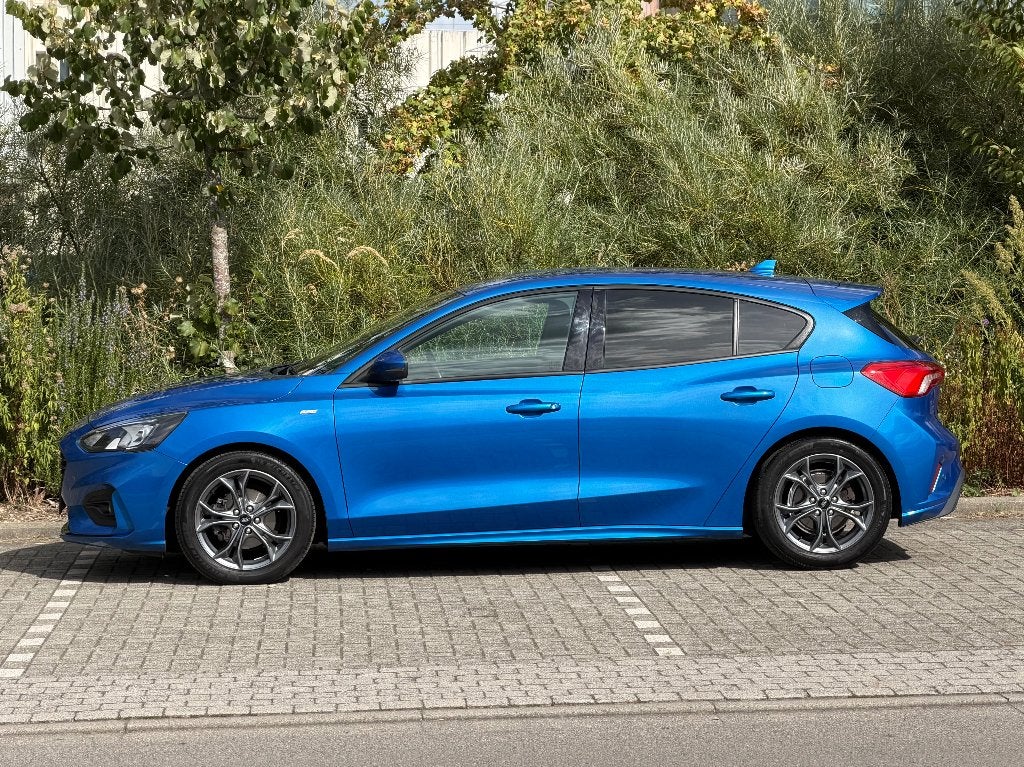 Ford Focus 1.0 EcoBoost ST-Line Navi,Airco,Cruise,PDC, Stof, 1280 kg, Blauw, Bedrijf