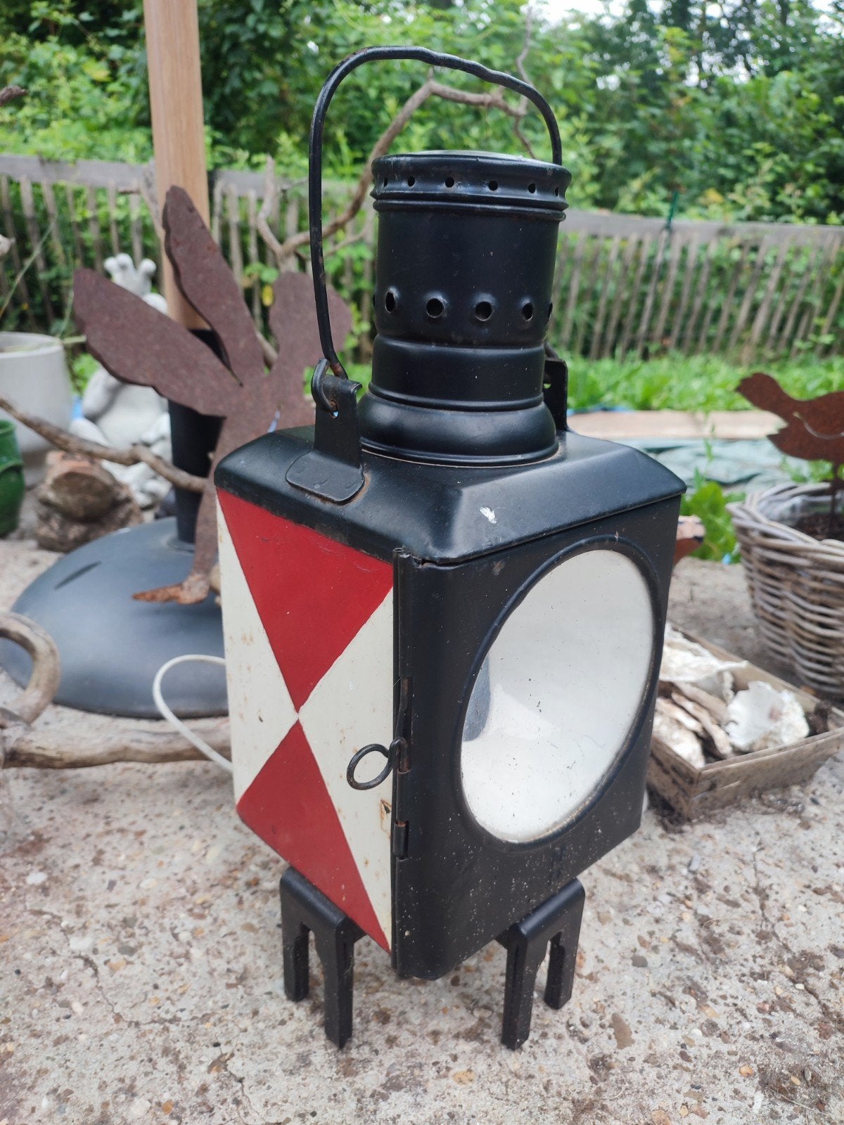 Oude stationslamp, Ophalen