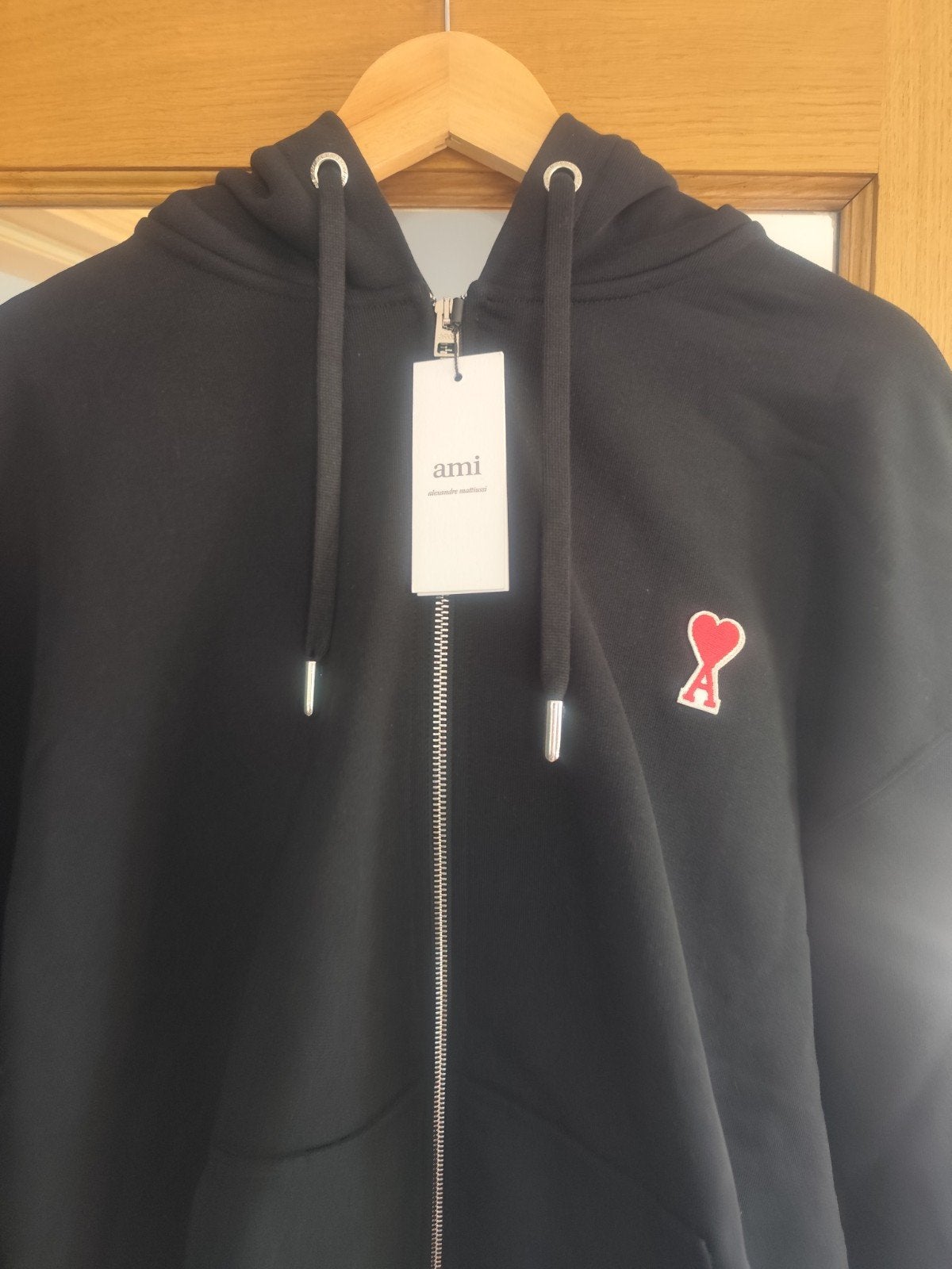 Sweat à capuche AMI PARIS.Neuf.Noir. XL. Envoi possible., Neuf, Enlèvement ou Envoi, Ami  Paris, Taille 56/58 (XL)