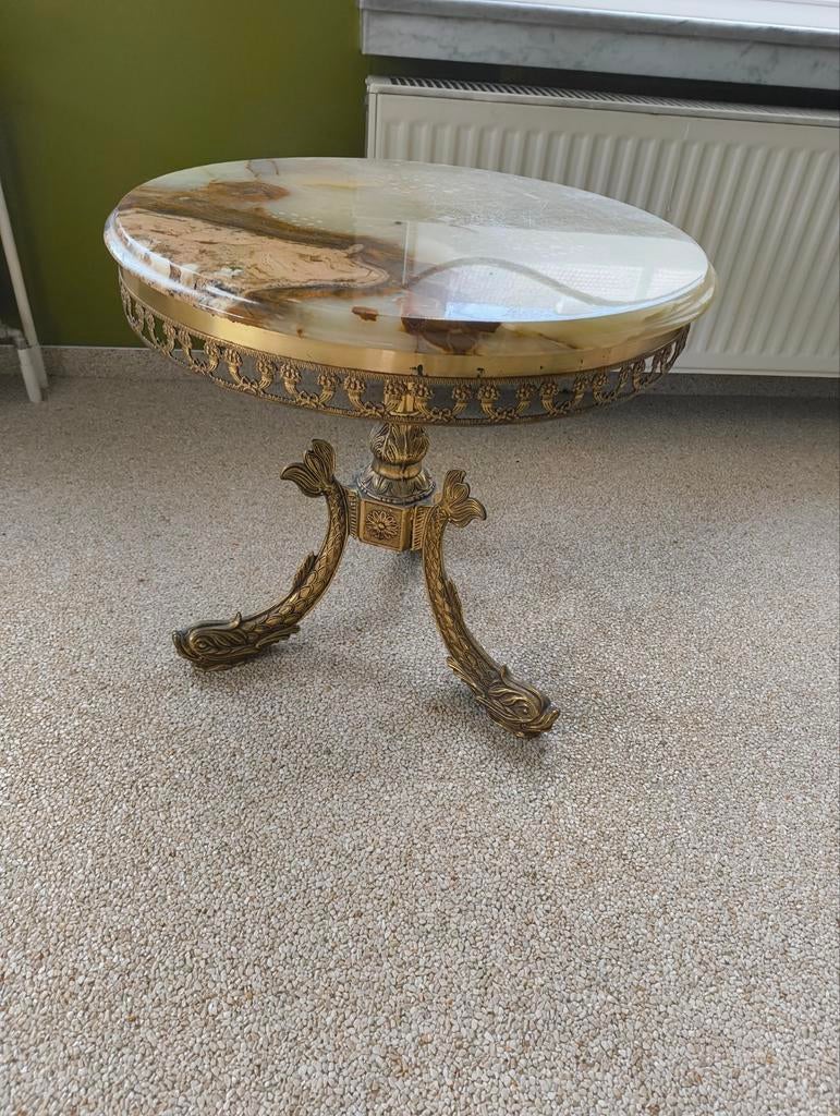Ronde marmeren tafel, Ophalen