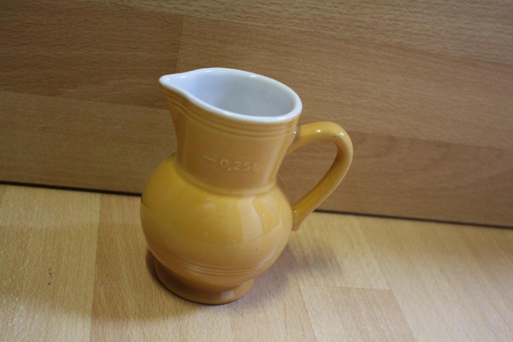 Schenkkan Emile Henry 25 cl, Huis en Inrichting, Keuken | Servies, Ophalen of Verzenden, Gebruikt, Keramiek, Effen