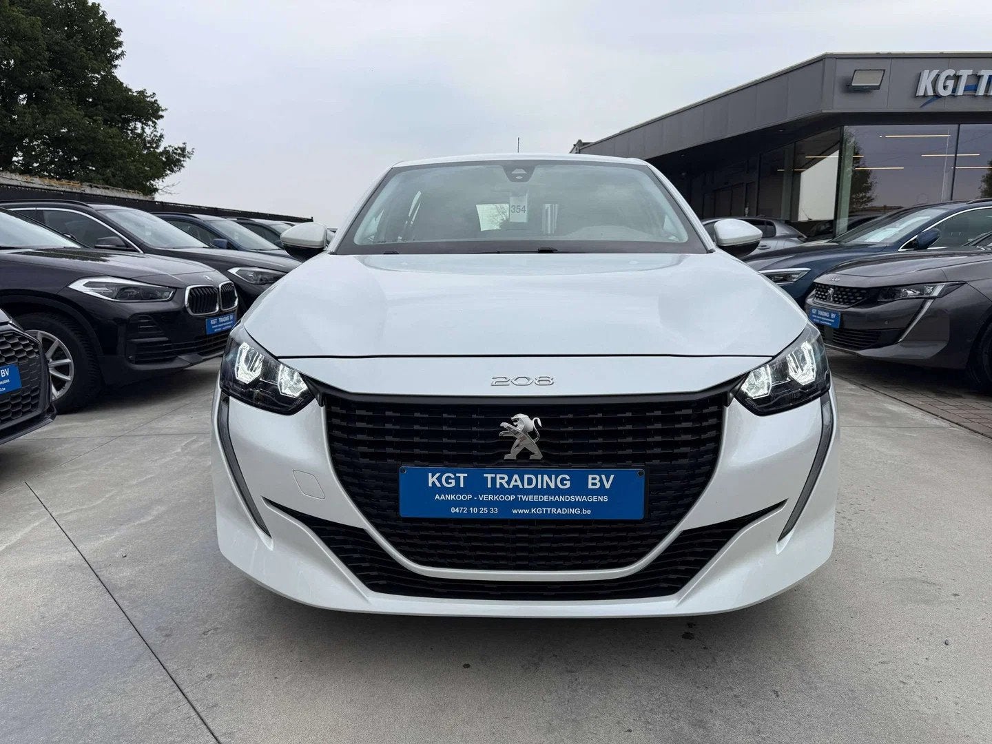 Peugeot 208 1.2i FULL LED NAVIGATIE CARPLAY BLUETOOTH PDC AI, Stof, 1199 cc, 1055 kg, Wit