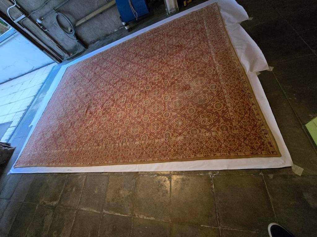 Ancien tapis Tabriz, Ophalen