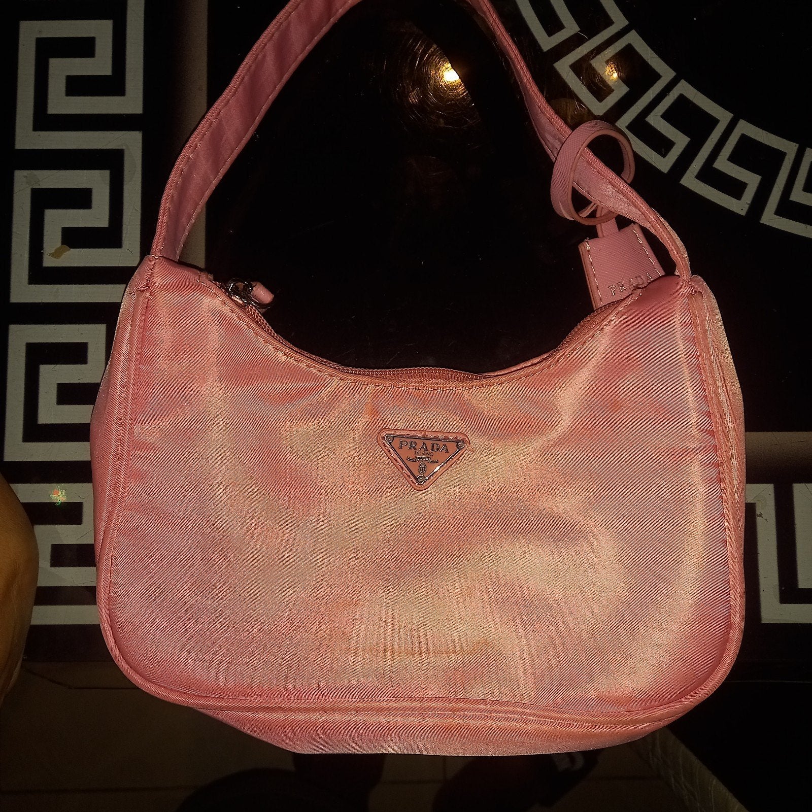 Sac prada, Enlèvement