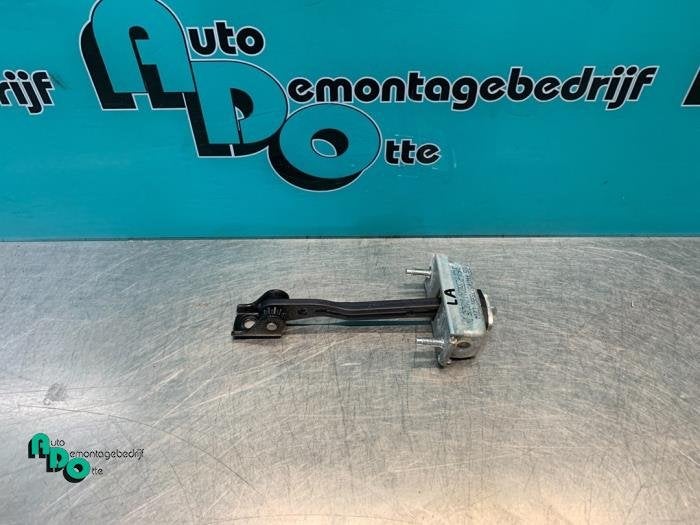 Butée 4portes arrière gauche d'un Ford Focus (Focus 04-), -, 3 mois de garantie, -, -