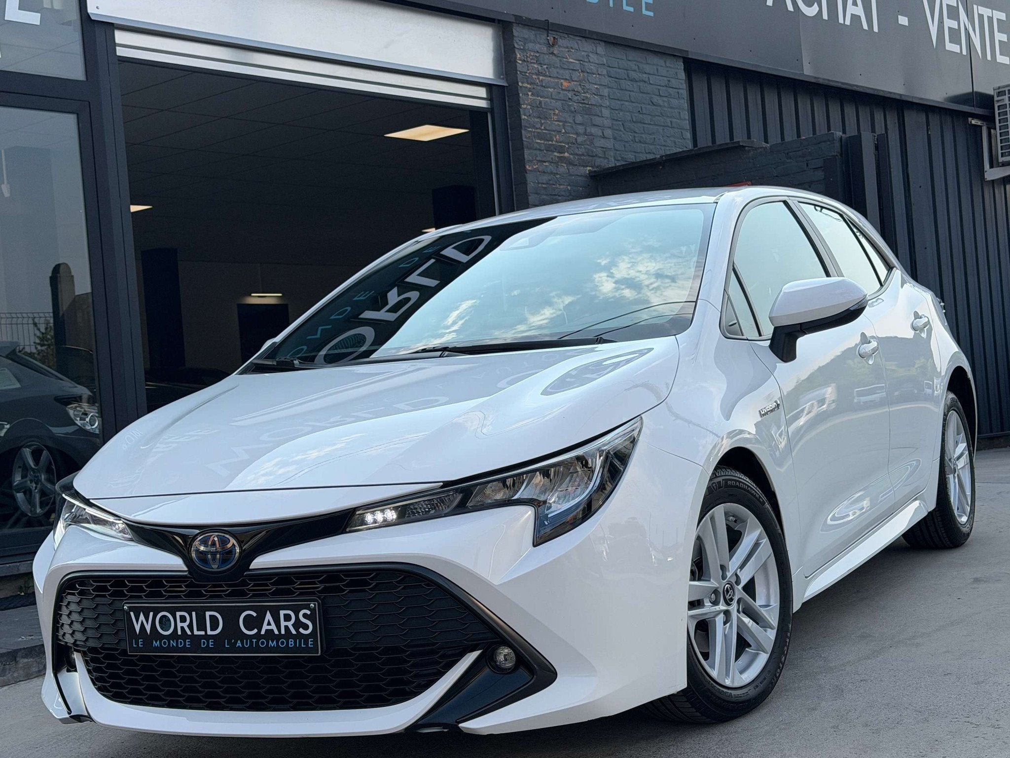 Toyota Corolla Corolla Hybrid 1.8 e-CVT CRUISE - CAMERA - LA, Auto's, Stof, Gebruikt, 4 cilinders, 72 kW