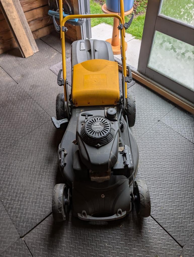 Grasmachine Stiga zelftrekker, Ophalen