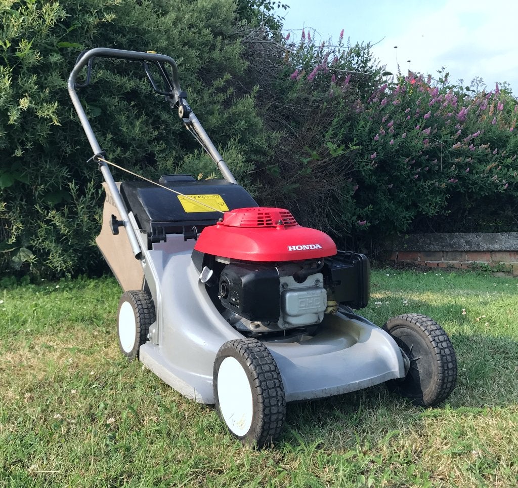 Honda Grasmachine te koop., Tuin en Terras, Grasmaaiers, Zo goed als nieuw, Benzine-grasmaaier, 50 cm of meer, Cirkelmaaier, Ophalen