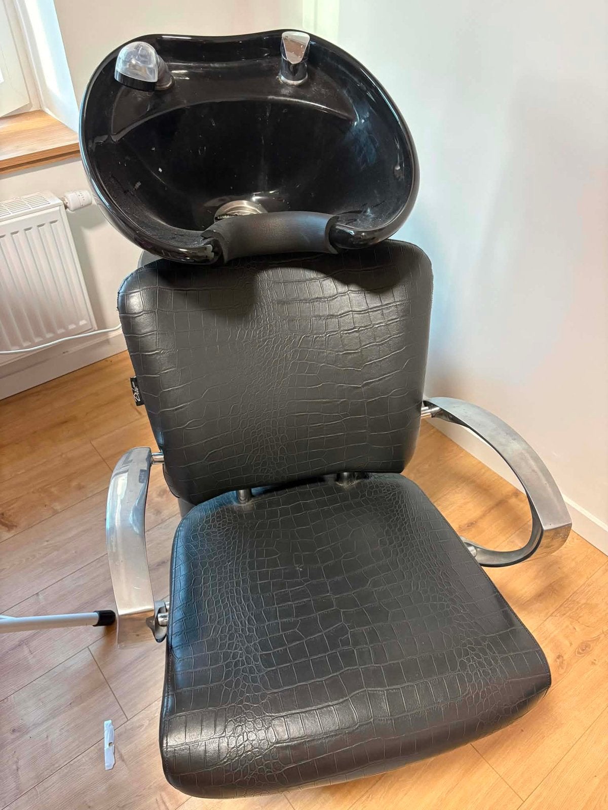 Wastafel voor kapsalon, Enlèvement