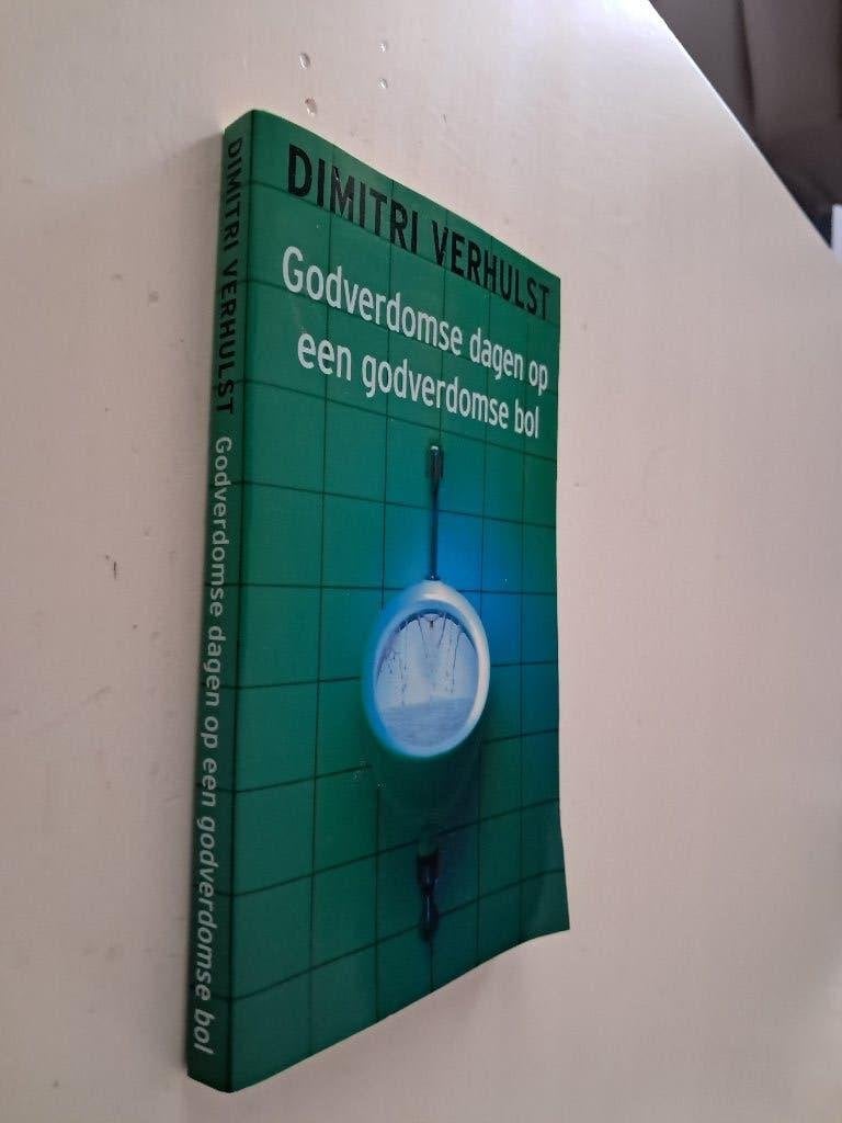 Dimitri Verhulst: Godverdomse dagen op een godverdomse bol., Ophalen of Verzenden
