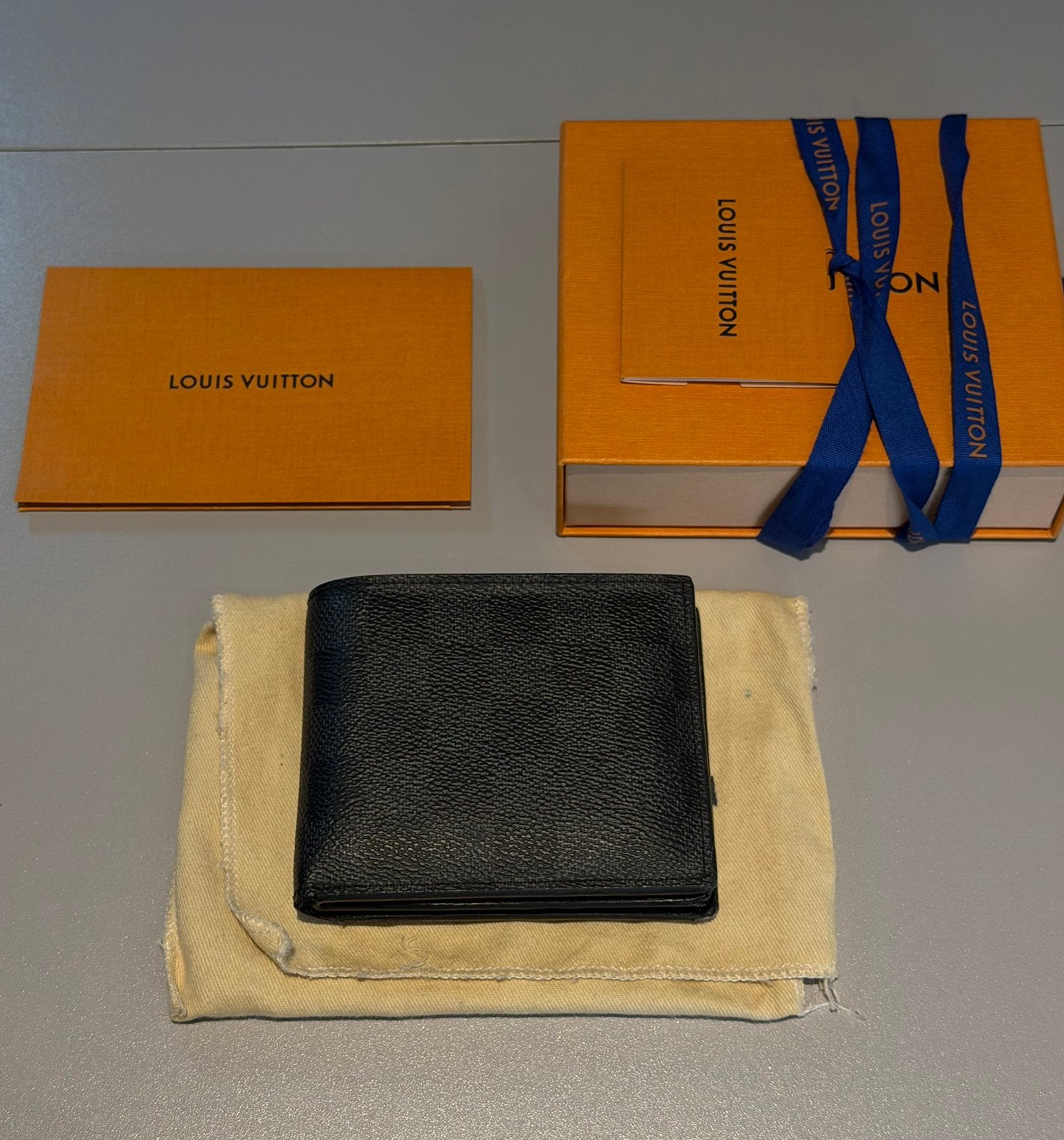 Louis Vuitton Amerigo portemonnee, Zwart, Zo goed als nieuw, Leder, Ophalen
