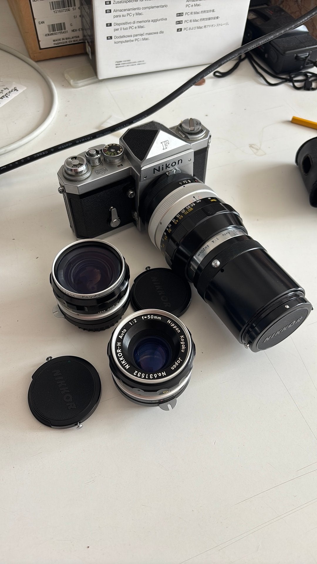 Appareil photo Nikon F + optiques, Enlèvement, Comme neuf, Nikon