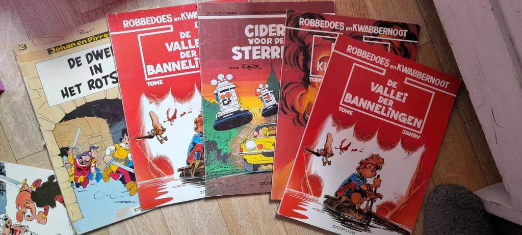5 strips van robbedoes, Ophalen