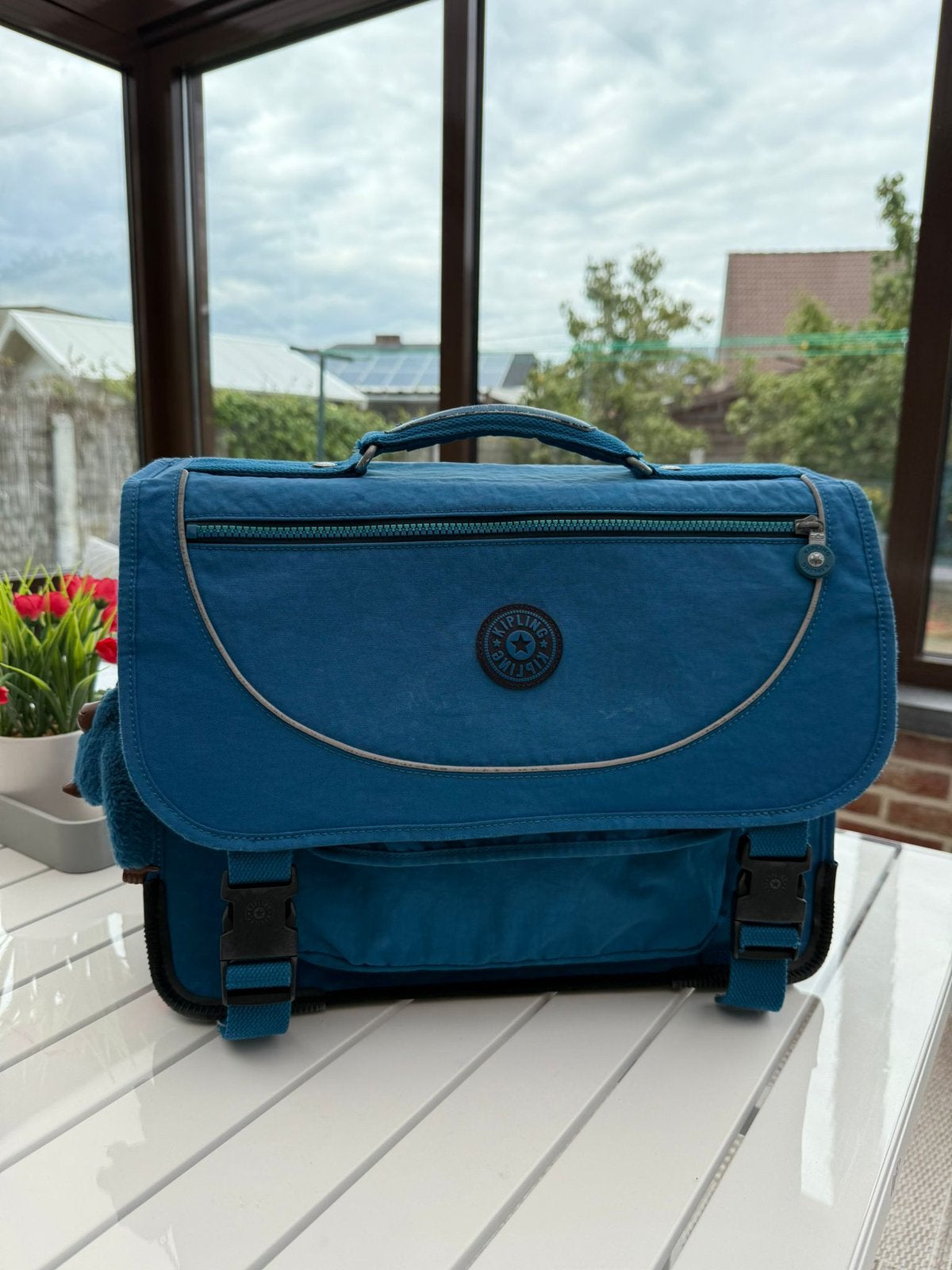 Kipling boekentas, Ophalen, Zo goed als nieuw