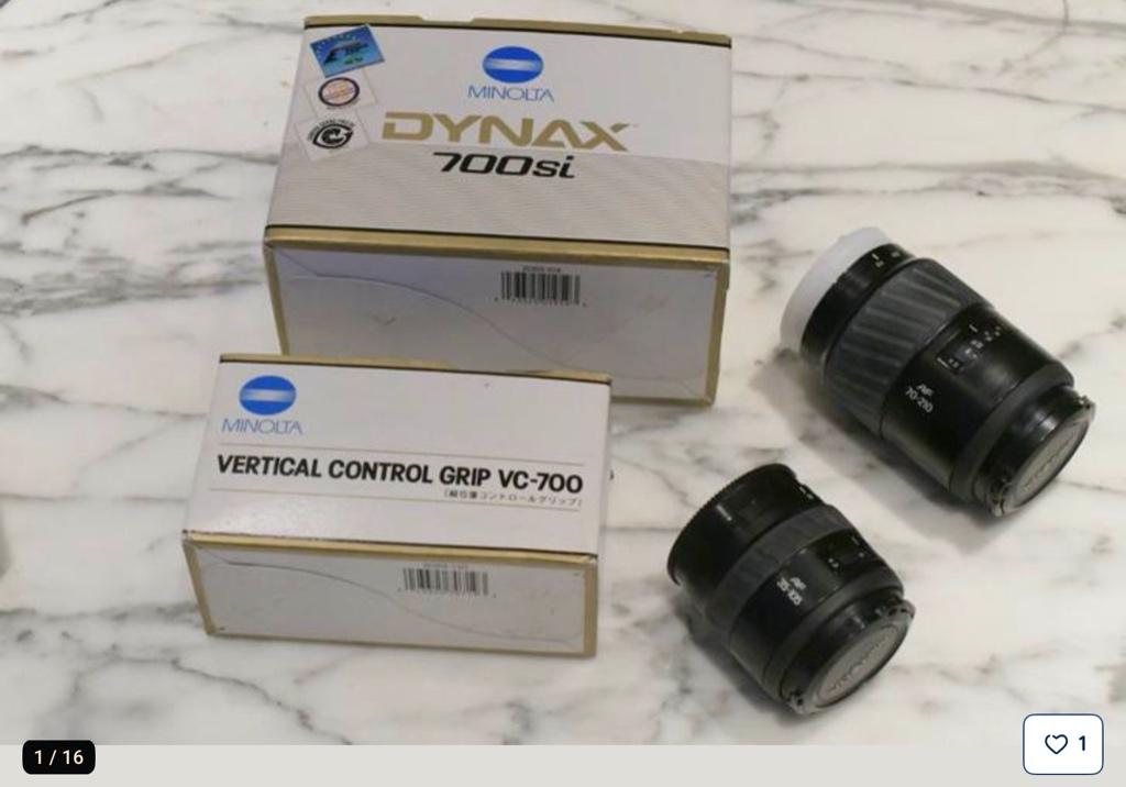Minolta camera Dynax 700 si, grip VC-700 en 2 lenzen, Ophalen of Verzenden, Gebruikt, Spiegelreflex, Minolta