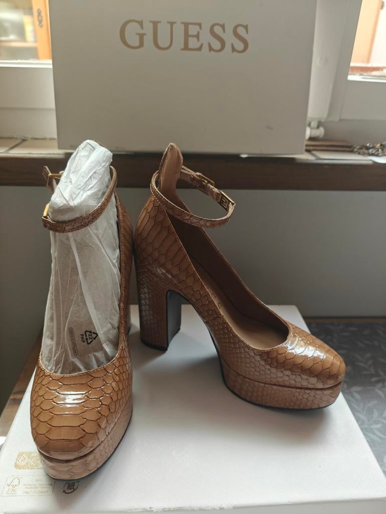 Les chaussures Guess sont encore neuves, Enlèvement