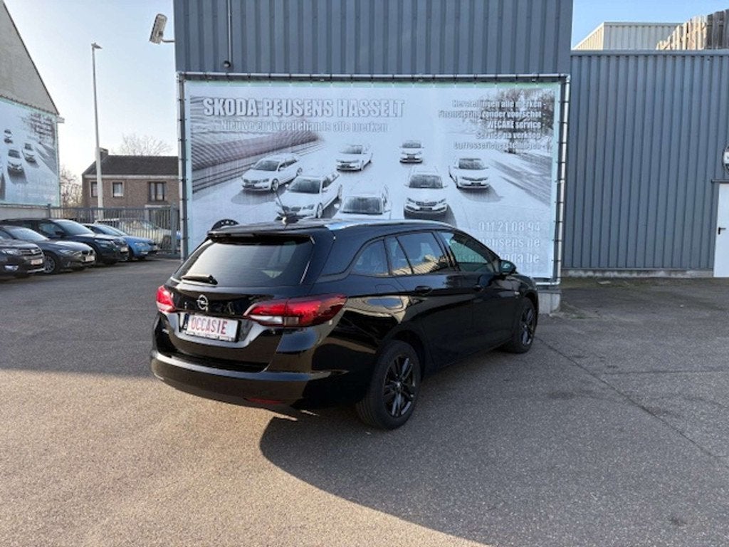 Opel Astra Sports Tourer 1.2 Turbo Edition 2020 S/S, Auto's, Opel, Stof, Gebruikt, Overige kleuren, https://public.car-pass.be/vhr/bf598b0a-9170-40d7-967d-5e5523198363