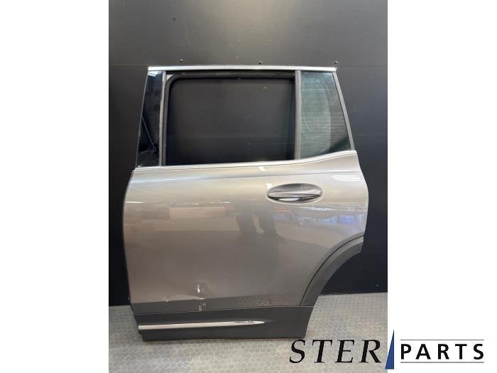 Portière 4portes arrière gauche d'un Mercedes GLB-Klasse (, 3 mois de garantie, Utilisé, Porte, -