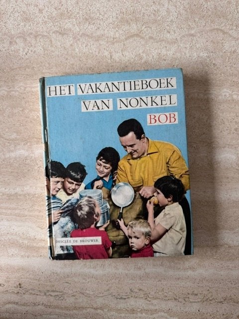 Boek "Het Vakantieboek van Nonkel Bob", Boeken, Ophalen of Verzenden, Gelezen, Non-fictie
