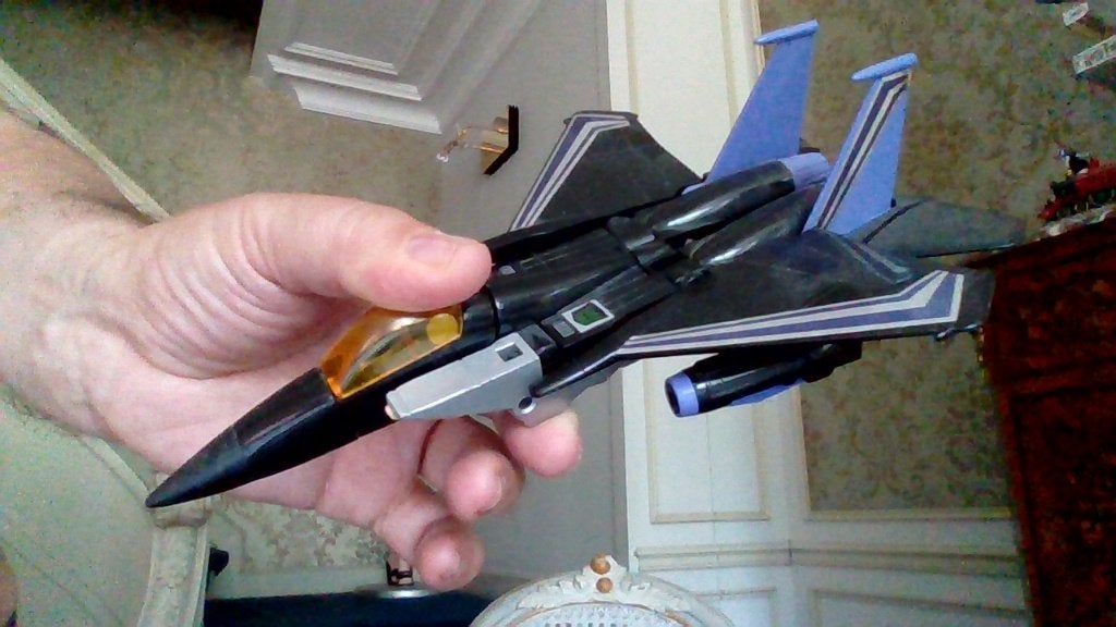 triple changer (transformers )il y a le pilote à l'intérieur, Enlèvement