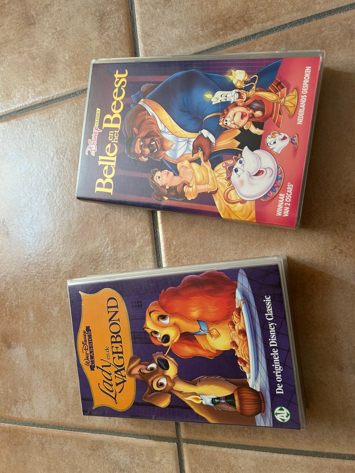 Belle & het beest - Lady en de vagebond VHS, Cd's en Dvd's, Ophalen, Zo goed als nieuw