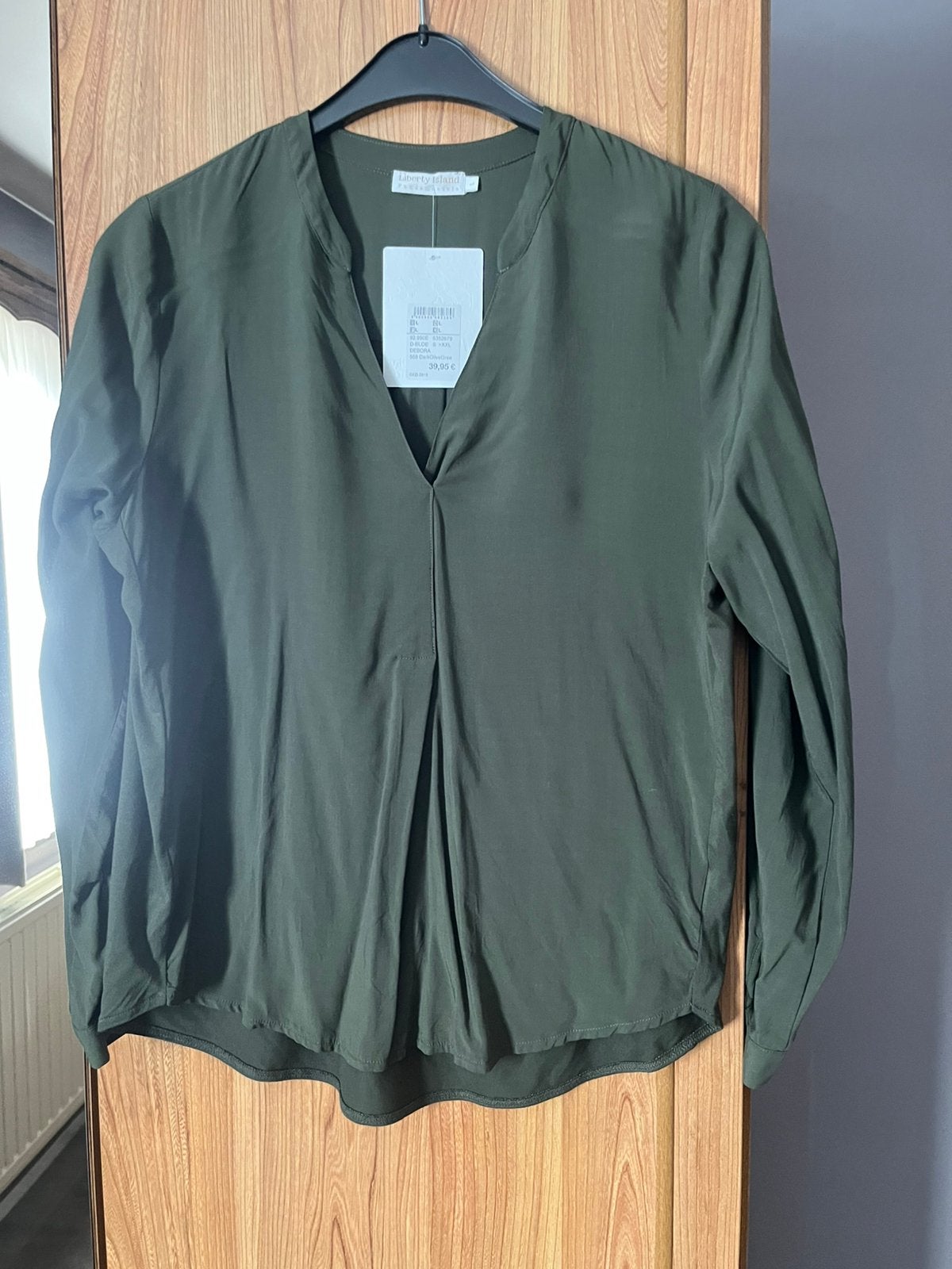 Nieuw maat L.Nieuwpijs 39.99 euro.Kleur khaki, Kleding | Dames, Ophalen of Verzenden, Nieuw, Maat 42/44 (L)
