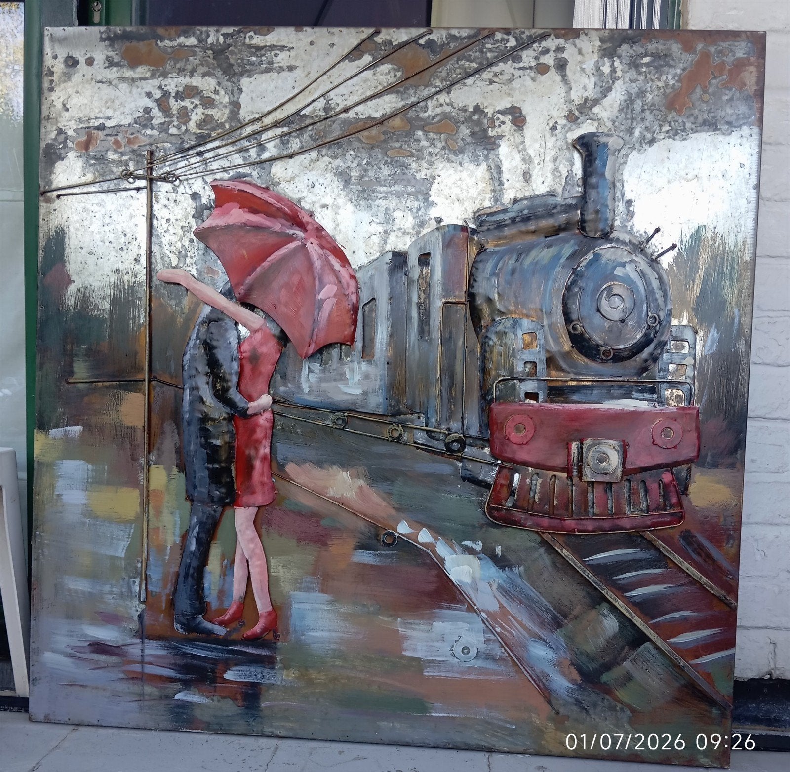 Tableau couple sur le quai 1m sur 1m. Métal en relief., Huis en Inrichting, Woonaccessoires | Wanddecoraties, Ophalen, Metaal