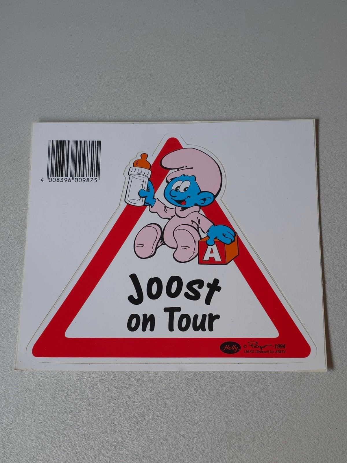 Autocollant Bébé Schtroumpf en voiture Joost, Collections, Schtroumpfs, Envoi, Comme neuf, Bébé Schtroumpf, Autres types