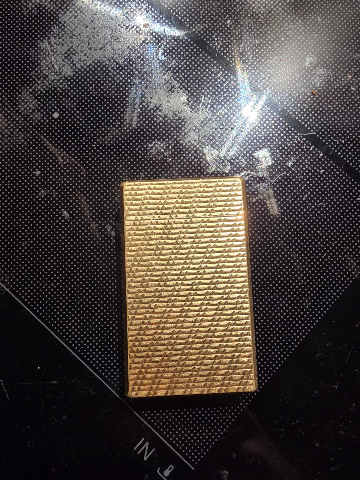 Vintage Dupont lighter, Enlèvement