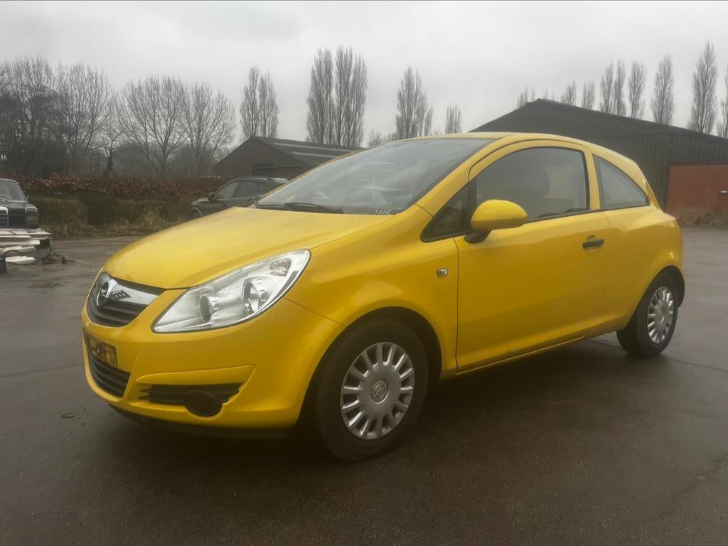 OPEL CORSA 1.0BENZINE VAN 2010 MET 65000DKM 12 GARANTIE, Auto's, Voorwielaandrijving, Stof, Zwart, Overige kleuren