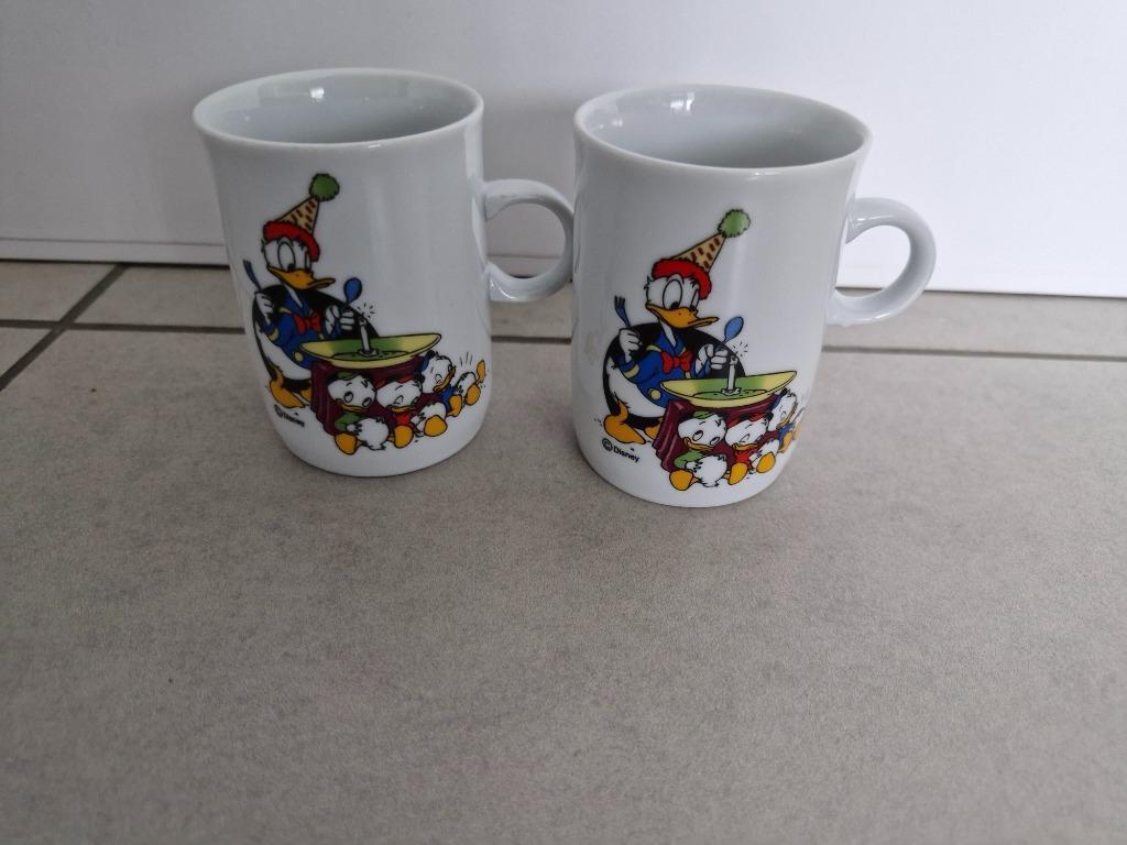 2 mokken Donald Duck €1 per stuk, Ophalen of Verzenden, Donald Duck, Zo goed als nieuw, Servies