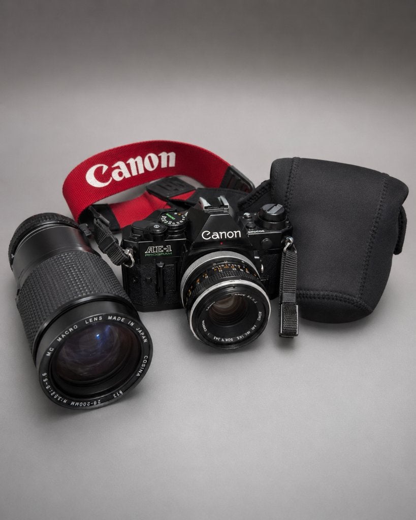 Canon AE-1 program + FL 50mm f/1.8 + Cosina 28-200 mm, Ophalen of Verzenden, Zo goed als nieuw, Spiegelreflex, Canon