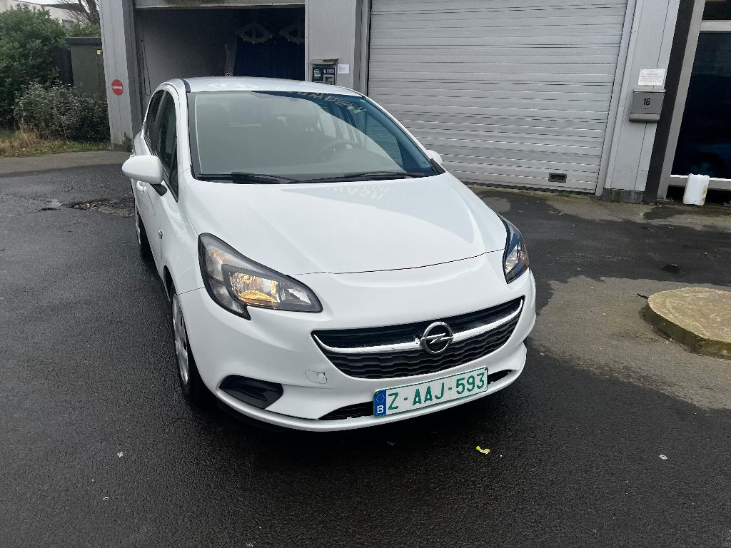 opel corsa met 57000 km met airco en garantie 061826 nr, Auto's, Voorwielaandrijving, Stof, Euro 6, 4 cilinders