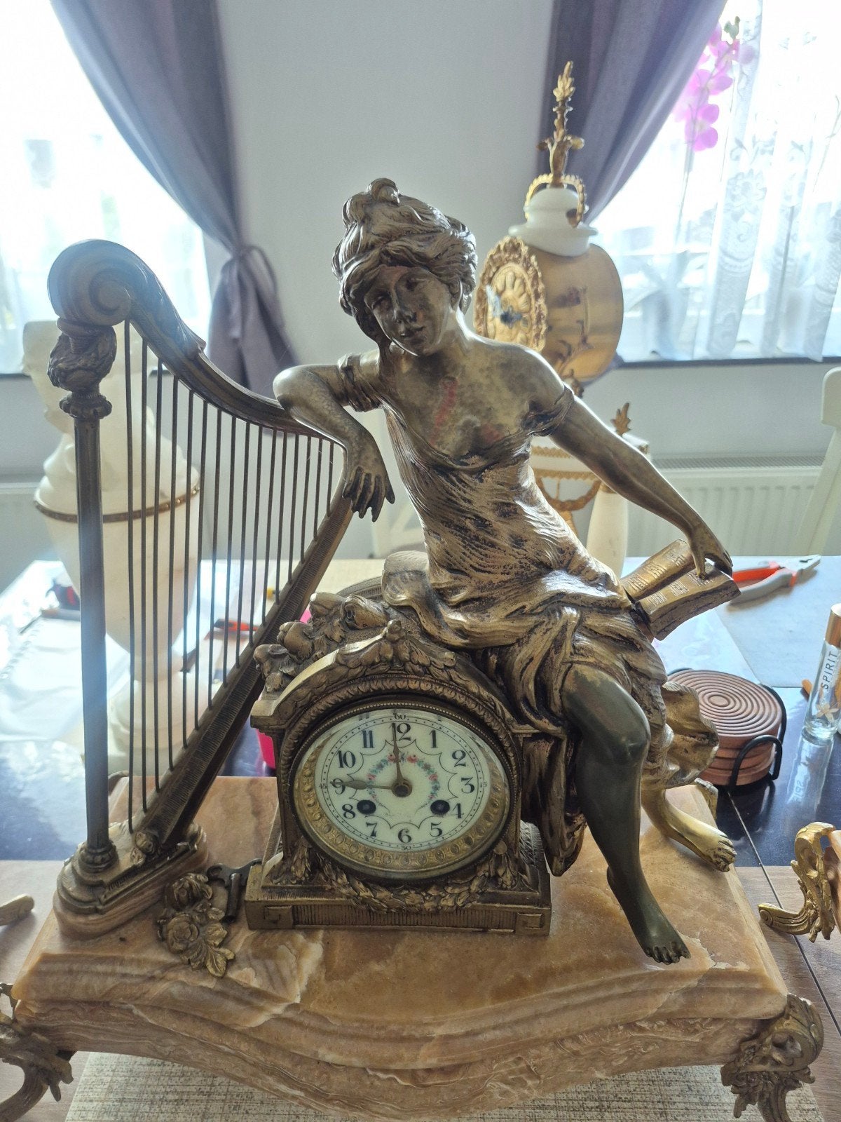 antiek bronzen klok, Ophalen