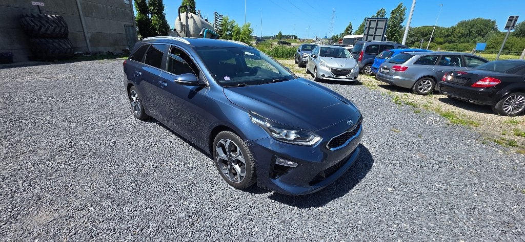 kia c eed sw 1.4 benzine automaat, Auto's, Kia, 1750 kg, 4 cilinders, Leder en Stof, Bedrijf