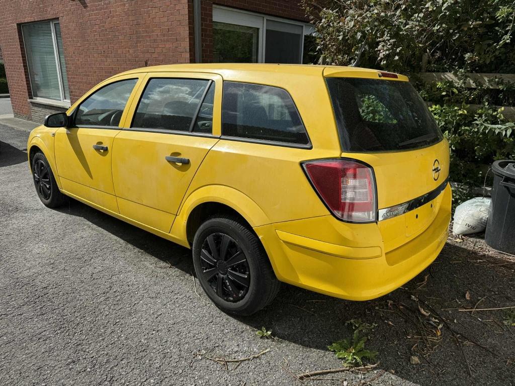 Opel Astra, Auto's, Voorwielaandrijving, Stof, Zwart, Geel